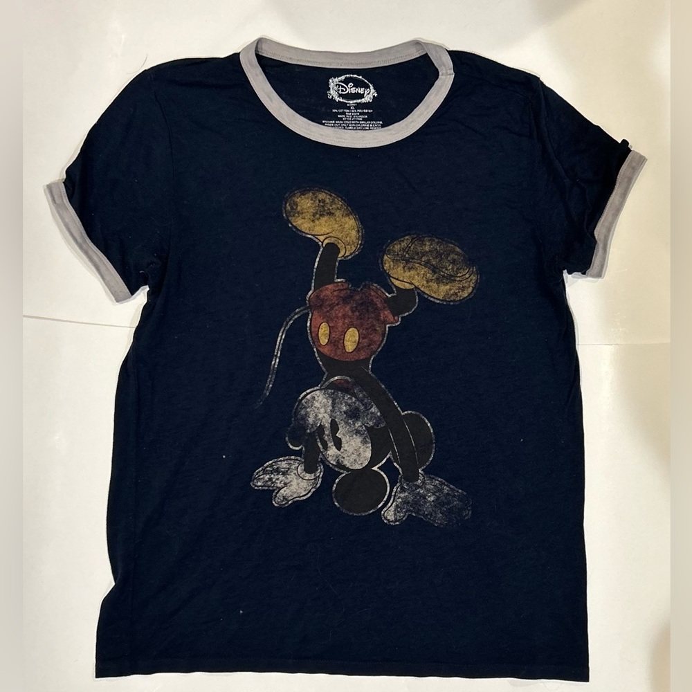 Navy blue graphic tee with vintage Mickey Mouse design and gray cuff detail